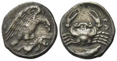 Greek Sicily, Akragas, c. 420-410 BC. AR Hemidrachm (16mm, 2.03g). Eagle r., clutching hare in talons. R/ Crab; below, fish r. Westermark, Coinage, 573; SNG ANS 1003-9; HGC 2, 104. Near VF