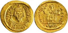 BYZANTINE PHOCAS, 602-610. AV Solidus (4.48 gms), Constantinople Mint, 4th Officina. S-618. Draped and cuirassed bust facing, wearing crown without pendilia and holding globus cruciger; Reverse: Angel