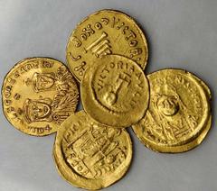 BYZANTINE BYZANTINE. Grouping of Gold Solidus. 5 pieces in lot. Includes Justinian I (2 pieces), Constans II, Theophilos (ex jewelry), and a Semissis of Heraclius. A few with light clipping or graffit