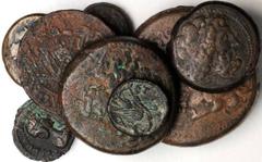 ANCIENT GREEK. Ptolemaic Egypt. Bronze Issues. 12 pieces in lot. An impressive mix of Ptolemaic Egypt bronze pieces. Most pieces feature the head of Zeus/Ammon on the obverse and an eagle standing on 