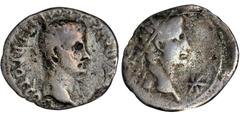 CALIGULA WITH DIVUS AUGUSTUS, A.D. 37-41. AR Denarius (3.02 gms), Lugdunum Mint, A.D. 37. VERY GOOD. Banker's Mark. RIC-2; RSC-11. Obverse: Bare head of Caligula right; Reverse: Radiate head of Divus 