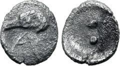 Greek Sicily, Akragas AR Hexas or Dionkion. Circa 450-440 BC. Eagle head to left; A below / Two pellets (mark of value). Westermark, Coinage, 522; HGC 2, 120. 0.07g, 5mm. Very Fine. Very Rare. Ex Leu 