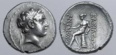 Greek Seleukid Empire, Antiochos (son of Seleukos IV) AR Tetradrachm. Antioch, circa 175 BC. Diademed head to right / Apollo Delphios seated to left on omphalos, holding arrow and resting hand on bow;