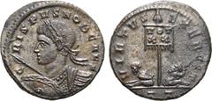 Roman Imperial Crispus, as Caesar, BI Nummus. Ticinum, AD 319-320. CRISPVS NOB CAES, laureate and cuirassed bust to left, holding spear and shield / VIRTVS EXERCIT, standard with VOT XX inscribed in t