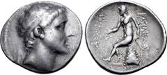 Greek Seleukid Empire, Antiochos II Theos AR Tetradrachm. Tralleis(?), circa 261-246 BC. Diademed head to right / Apollo Delphios, testing arrow and resting hand on grounded bow, seated to left on omp