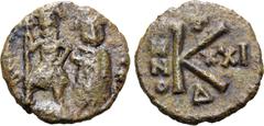 Byzantine Heraclius Æ 20 Nummi. Ravenna, dated RY 21 = AD 630/1. Traces of legend, Heraclius and Heraclius Constantine standing facing; Heraclius, bearded, wearing crown and military attire, holding l