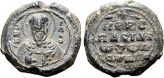 BYZANTINE Byzantine Iconographic PB Seal of Basil, Notarios. Circa 10th - 11th centuries AD. Bust of St Basil, nimbate, offering a blessing with his right hand and holding the book of Gospels in his l