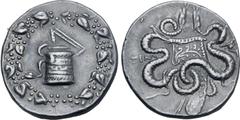 Greek Lydia, Tralleis AR Cistophoric Tetradrachm. Circa 166-160 BC. Serpent emerging from cista mystica; all within ivy wreath / Two serpents entwined around ornate bow and bowcase; TPAΛ to left, bukr