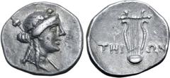 Greek Ionia, Teos AR Triobol. Circa 394-300 BC. Ivy-wreathed head of Dionysos to right, thyrsos over far shoulder / Lyre; THI-ΩN across fields. BMC 26; SNG Copenhagen 1444. 1.79g, 13mm, 12h. Good Very