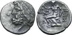GREEK Arkadia, Megalopolis AR Triobol or Hemidrachm. Circa 80-50 BC. Laureate head of Zeus to left / Pan seated to left on rock, right hand raised and holding lagobolon with left, with eagle to left a