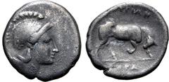 Greek Lucania, Thourioi AR Triobol. Circa 350-300 BC. Head of Athena to right, wearing crested Attic helmet, decorated with wreath / Bull butting to right; [ΘO]YPIΩN above, HPA in exergue. SNG Lloyd 5