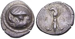 Elis, Olympia AR Stater. Circa 388 BC, struck for the 98th Olympiad. Eagle standing left, grasping the back of a ram with its talons and tearing at its neck with its beak; the whole on round shield wi