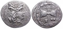 Islands off Troas, Tenedos AR Tetradrachm. Circa 100-70 BC. Janiform head composed of a laureate and bearded head of Zeus to left and a diademed head of Hera to right / TENEDIWN, Double axe; monogram 