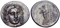 Satraps of Karia, Pixodaros AR Didrachm. Halikarnassos, circa 340-334 BC. Laureate head of Apollo, three quarters facing, drapery at neck / Zeus Labraundos standing right, holding double-axe (labrys) 