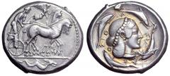 Sicily, Syracuse AR Tetradrachm. Sicily, Syracuse AR Tetradrachm. Deinomenid Tyranny. Struck under Hieron I or Thrasybulos, circa 467- 465 BC. Charioteer, holding kentron in right hand and reins in le