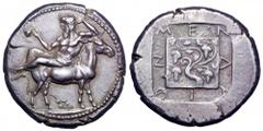 Macedon, Mende AR Tetradrachm. Macedon, Mende AR Tetradrachm. Circa 460-423 BC. Dionysos, bearded and wearing ivy wreath and himation, holding a kantharos in his right hand, reclining left on the back