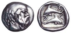 Islands off Thrace, Thasos AR Hemiobol. Islands off Thrace, Thasos AR Hemiobol. Circa 411-404 BC. Bald head of satyr right / Two dolphins swimming in opposite direction, ΘAΣ around; all within shallow