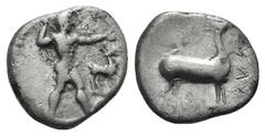 Bruttium, Kaulonia AR Didrachm. Bruttium, Kaulonia AR Didrachm. c. 475-425. Apollo advancing r., holding branch; to r., stag standing r. / Stag standing r. HNItaly 2044. 7.63g, 21mm, 7h. Good F