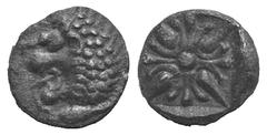 Ionia, Miletos AR Tetartemorion. Ionia, Miletos AR Tetartemorion. late 6th-early 5th C. Head of a roaring lion l. / Floral or stellar pattern. Cf. CNG 210, lot 42. 0.27g, 7mm. Toned EF