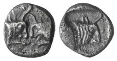 Karia, AR Tetartemorion. Karia, AR Tetartemorion. Uncertain mint, c. 5th C. BC. Confronted foreparts of two bulls / Forepart of a bull r., in incuse square. SNG Kayhan 969. 0.23g, 6mm, 1h. EF