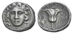 Islands off Karia, Rhodos AR Hemidrachm. Islands off Karia, Rhodos AR Hemidrachm. 2nd C. BC. Lyson, magistrate. Head of Helios facing slightly l. / Rose; dolphin to l. BMC 178. 2.04g, 13mm, 12h. Light