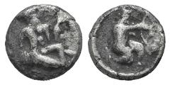 Cilicia, uncertain mint. AR Hemiobol Cilicia, uncertain mint. AR Hemiobol 4th C. BC. Herakles kneeling r., drawing bow / Female figure seated r. on the ground. Klein 641. 0.32g, 7mm, 12h. Toned VF