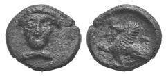Cilicia, uncertain mint. AR Tetartemorion Cilicia, uncertain mint. AR Tetartemorion 4th C. BC. Female head facing / Sphinx seated l., raising r. paw. Troxell-Kagan 20. 0.17g, 7mm, 12h. Toned EF