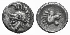 Cilicia, uncertain mint. AR Tetartemorion. Cilicia, uncertain mint. AR Tetartemorion. Early-mid 4th C. BC. Bearded and helmeted head l. / Head of lion r. Troxell -Kagan 15. 0.17g, 6mm, 4h. Toned VF
