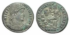 Constantine I BI Nummus. Constantine I BI Nummus. Constantinople, 329. Laurel and rosette-diademed, draped and cuirassed bust r. / Victory seated l. on cippus, head r., holding palm branch in each han
