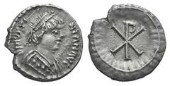 Justinian I AR Half Siliqua (?). Justinian I AR Half Siliqua (?). Ravenna, 552-565. Pearl-diademed bust r., wearing robe decorated with three pellets / Large Christogram within wreath. MIBE 77; DOC 33