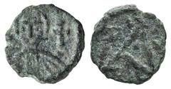 Justin II Æ Nummus. Justin II Æ Nummus. Carthage, 567-578. Nimbate bust facing between two crosses / Large A with stars around. MIBE 213; DOC 310 (Justinian I); Sear 282 (same). 0.54g, 9mm, 6h. Very r