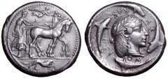 Sicily, Syracuse AR Tetradrachm. Sicily, Syracuse AR Tetradrachm. Deinomenid Tyranny. Time of Hieron I, circa 475-470 BC. Dies by the Demareteion Master. Charioteer wearing a long chiton and holding a