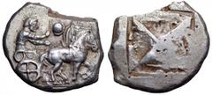 Macedon, Olynthos AR Tetradrachm. Macedon, Olynthos AR Tetradrachm. Circa 510 BC. Charioteer driving walking quadriga to right, wearing long chiton and holding whip in right hand, reins in his left; l