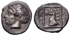 Ionia, Phokaia AR Tetartemorion. Circa 480 BC. Head of Apollo l. / Head of griffin l. within linear square. SNG Copenhagen 1033 var. 0.31g, 8mm, 9h. Extremely Fine, toned and of fine early classical s