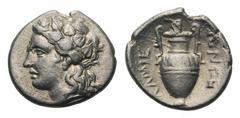 Thessaly, Lamia AR Hemidrachm.Thessaly, Lamia AR Hemidrachm. Circa 400-350 BC. Head of Dionysos left, wearing ivy wreath / Amphora; ivy leaf above, prochous (small jug) to right, ΛAΜΙΕΩΝ around. Georg