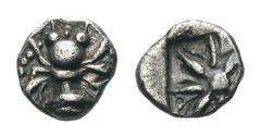 Ionia, Ephesos AR Hemiobol.Ionia, Ephesos AR Hemiobol. Circa 500-420 BC. Bee / Star of eight rays within incuse square. SNG Kayhan 136. 0.29g, 5mm. Attractive toning, Very Fine.