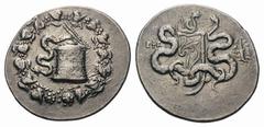 Ionia, Ephesos AR Cistophoric Tetradrachm.Ionia, Ephesos AR Cistophoric Tetradrachm. Circa 166-67 BC. Cista mystica with serpent; all within ivy wreath / Bowcase with serpents; rudder in wreath in rig