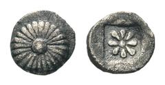 Ionia, Erythrai(?) AR Tetartemorion.Ionia, Erythrai(?) AR Tetartemorion. Circa 480-450 BC. Rosette or sunburst with central boss / Eight-rayed star within incuse square. Klein 387; Kraay, Colophon 96,