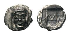 Ionia, Kolophon AR Hemiobol.Ionia, Kolophon AR Hemiobol. Circa 450-410 BC. Facing head of Apollo / Monogram within incuse rectangle. Milne, Colophon 3. 0.47g, 7mm, 4h. Very Fine.