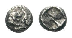 Kings of Lydia, Kroisos AR 1/24 Stater.Kings of Lydia, Kroisos AR 1/24 Stater. Sardes, circa 550-546 BC. Confronted foreparts of lion and bull / Incuse punch. Klein 562. 0,36g - 5mm. Very Fine.