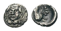 Cilicia, Uncertain mint AR Hemiobol.Cilicia, Uncertain mint AR Hemiobol. Circa 4th Century BC. Facing veiled female bust / Forepart of Griffin right. Troxell/Kagan -; Klein - 0.39g, 7mm, 8h. Very Fine