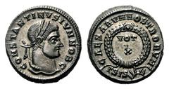 Constantine II Æ Follis.Constantine II Æ Follis. Siscia, AD 321-324. Laureate head right / VOT X within wreath, ΓSIS sunburst in exergue. RIC 182. 3.57g, 19mm, 7h. Well centred, Extremely Fine.
