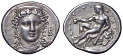 Bruttium, Kroton AR Stater. Circa 400-325 BC. Head of Hera Lakinia facing slightly right, wearing necklace and stephane decorated with palmettes; B to right / Young Herakles, nude, holding cup in exte