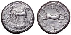 Bruttium, Rhegion AR Tetradrachm. Anaxilas, Tyrant. Circa 475-474 BC. Bearded, seated charioteer (Anaxilas?), holding reins with both hands, driving walking mule biga to right; bay leaf in exergue / H