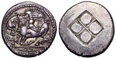 Macedon, Akanthos AR Tetradrachm. Circa 500-480 BC. Bull, with head raised and reverted, kneeling to left, attacked by lion leaping on to its back; bukranion below dotted exergual line / Quadripartite