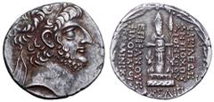 Seleukid Kingdom. Antiochos XII AR Tetradrachm. Damascus, dated year 227 (86/85 BC). Diademed head right / Cult statue of Hadad standing facing on double basis, flanked by two bull foreparts, holding 