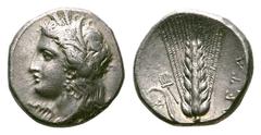 Lucania, Metapontum AR Didrachm. Lucania, Metapontum AR Didrachm. 330-290 BC. Head of Demeter left, wearing barley wreath / Ear of barley, with pitchfork on leaf. SNG ANS 452; Johnston C 5.4; HN Italy