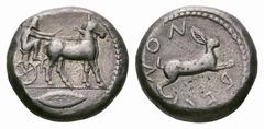 Bruttium, Rhegion AR Tetradrachm. Bruttium, Rhegion AR Tetradrachm. Anaxilas, Tyrant. Circa 475-474 BC. Bearded, seated charioteer (Anaxilas?), holding reins with both hands, driving walking mule biga