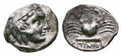 Islands off Karia. Kos AR Hemidrachm. Islands off Karia. Kos AR Hemidrachm. 285-258 BC. Head of young Herakles right in lion skin headdress / ΚΩΙΟΝ, crab above horizontal club, below magistrate's name