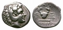 Islands off Caria. Cos AR Hemidrachm. Islands off Caria. Cos AR Hemidrachm. 285-258 BC. Head of young Herakles right in lion skin headdress / ΚΩΙΟΝ, crab above horizontal club, below magistrate's name